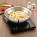 magnus stainless steel triply tasla 24 cm with induction cooktop cooking top view